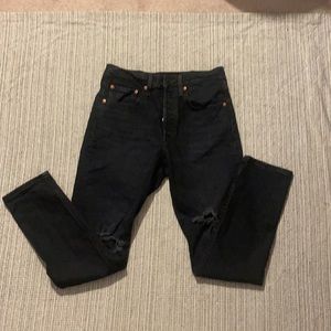 Levi’s 501 distressed denim jeans